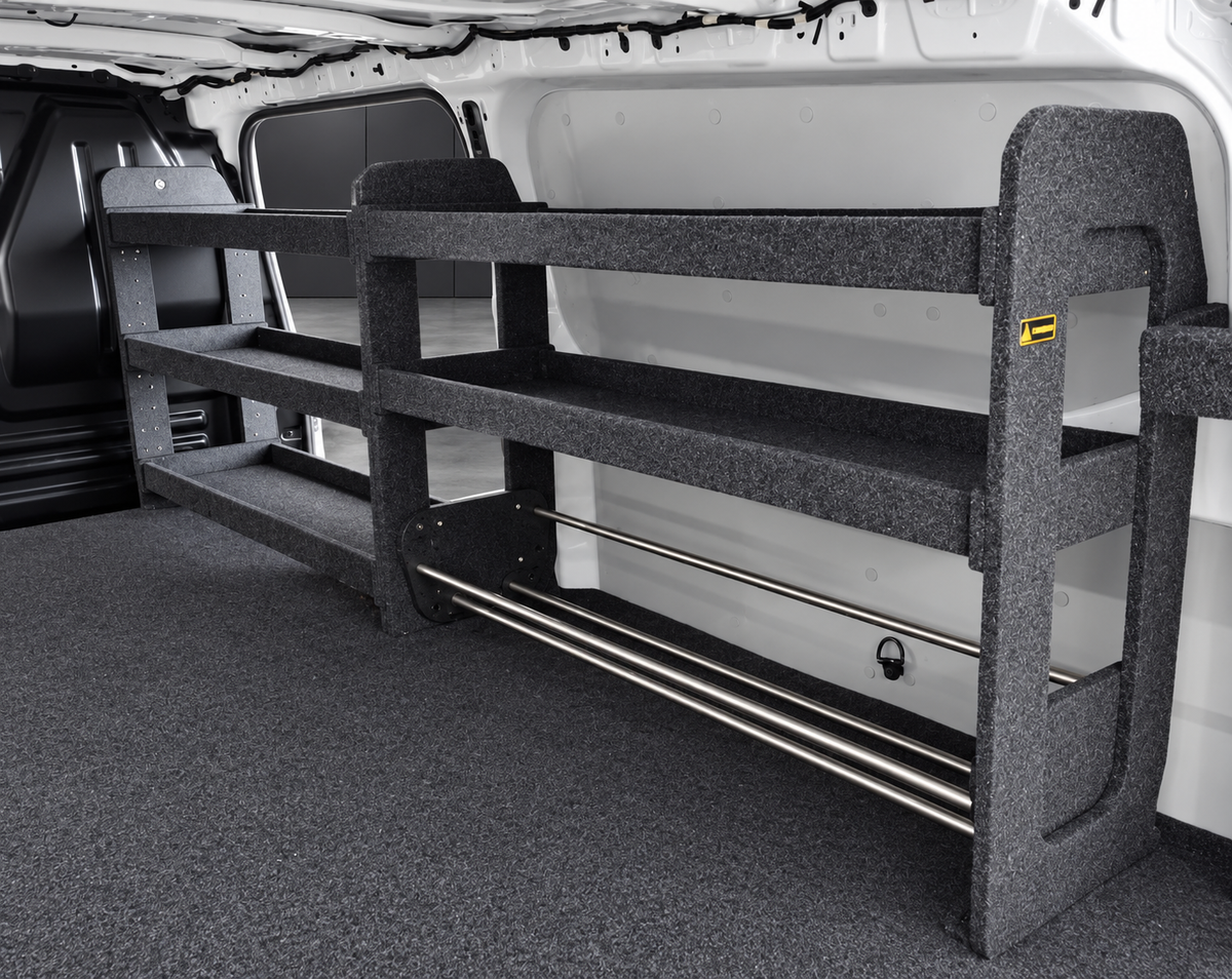Wide view of drawer top shelving with base cable holder installed in a van