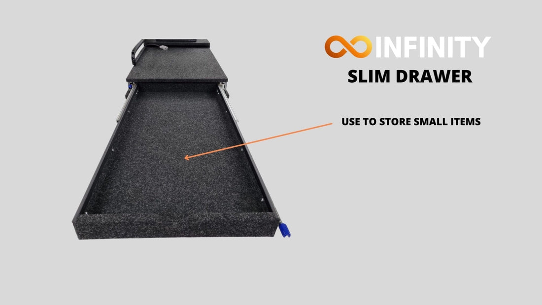Archived INFINITY slim-drawer demonstration showing shallow storage below a sliding deck