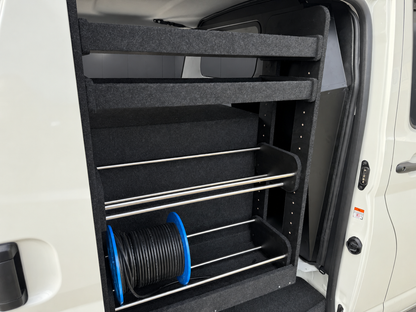 Close-up of full-height shelving with two cable-holder rows and a blue cable roll