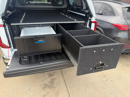 EvaKool 40 litre fridge and divided storage drawer both open in a VW Amarok