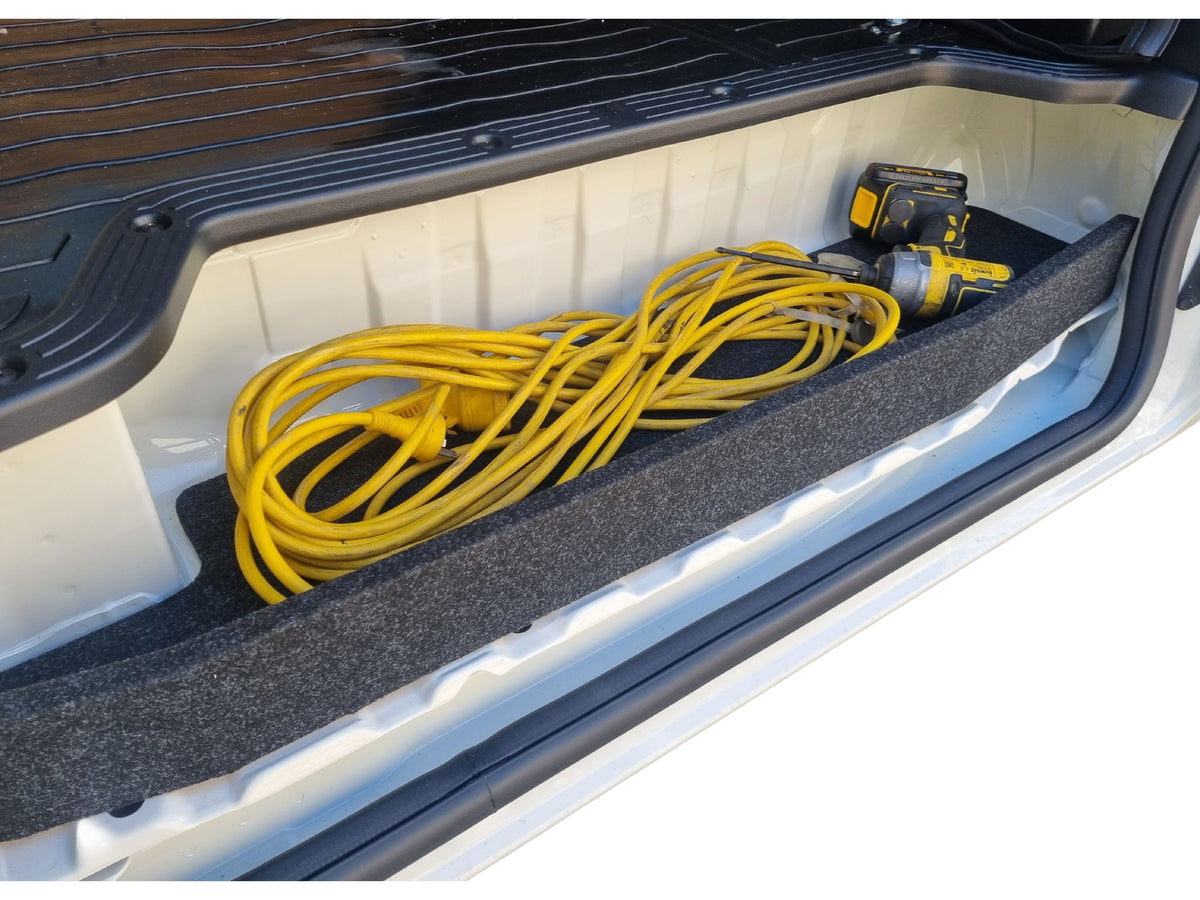 Toyota HiAce Step Shelf holding an extension lead and hand tools