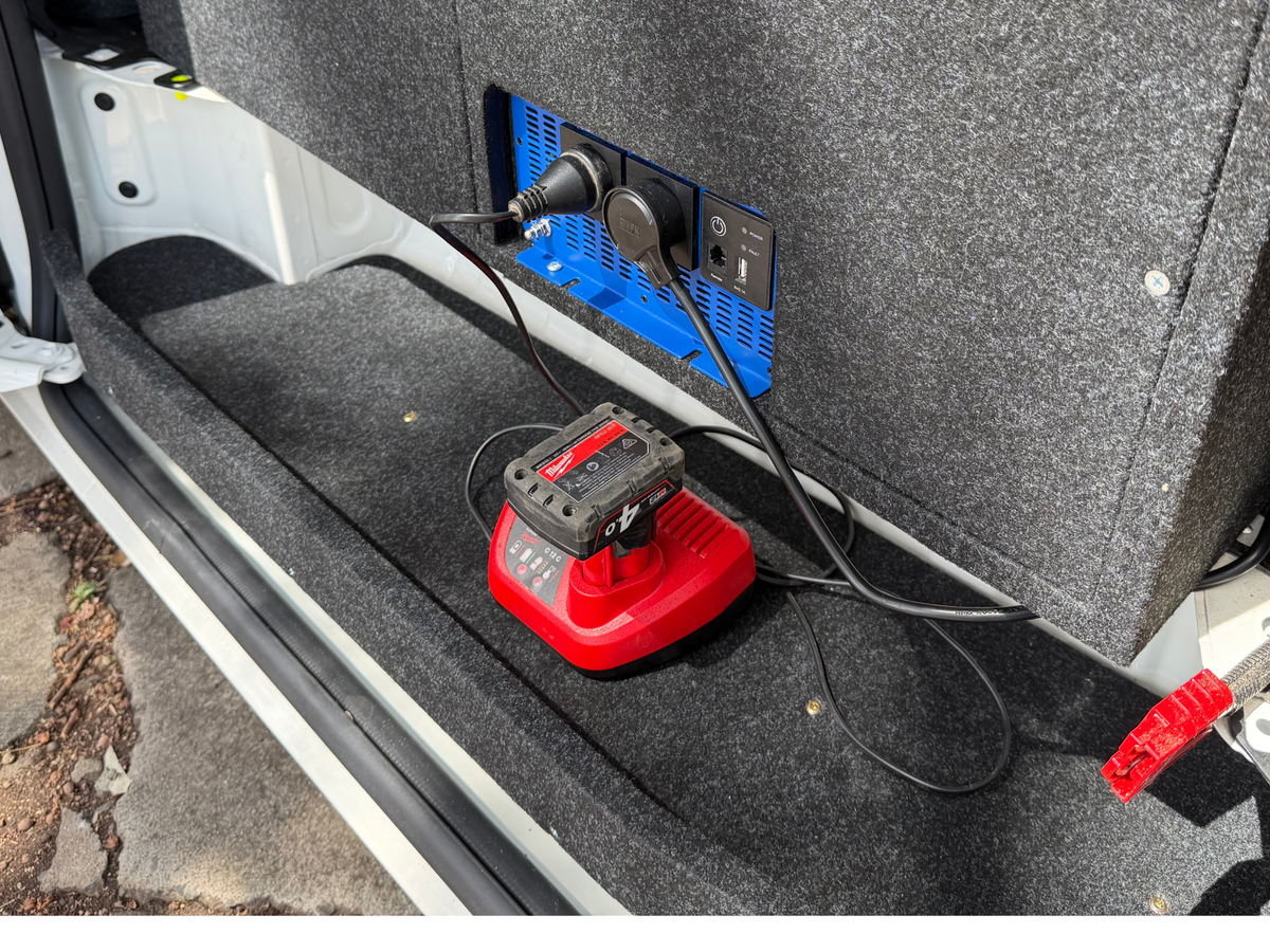 HiAce Step Shelf shown holding a tool charger beneath a van drawer system; electrical equipment is separate