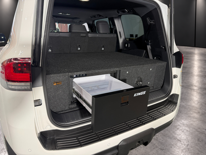 Kings 30 litre drawer fridge open in a LandCruiser 300 INFINITY raised module system; wagon installation example, ute layout differs
