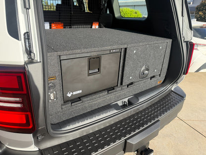 Prado 250 INFINITY drawer and Bushman fridge closed with carpeted top decks; wagon installation example, ute layout differs