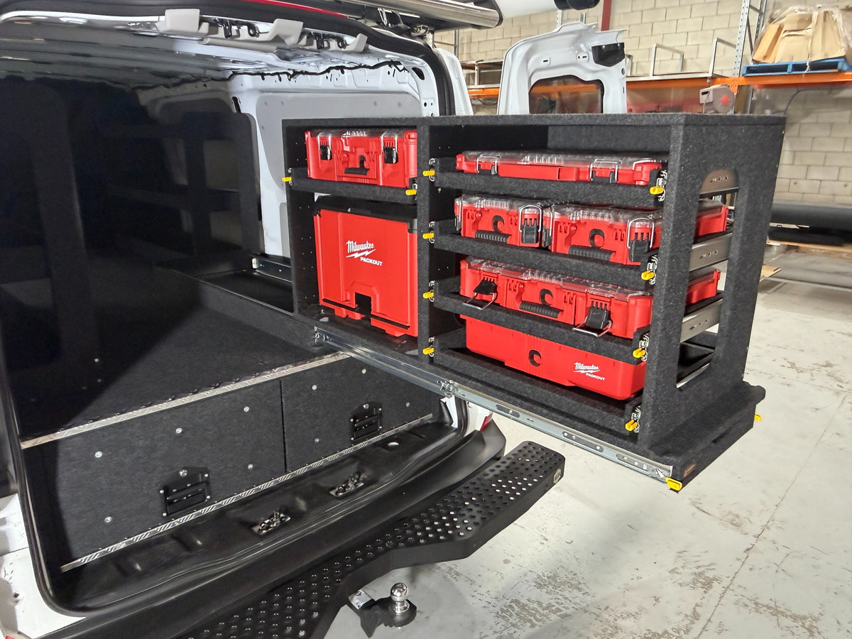 Milwaukee Easy Access System fitted above van drawers in a Ford Transit Custom, with PACKOUT organisers and cabinet stored in two stacks