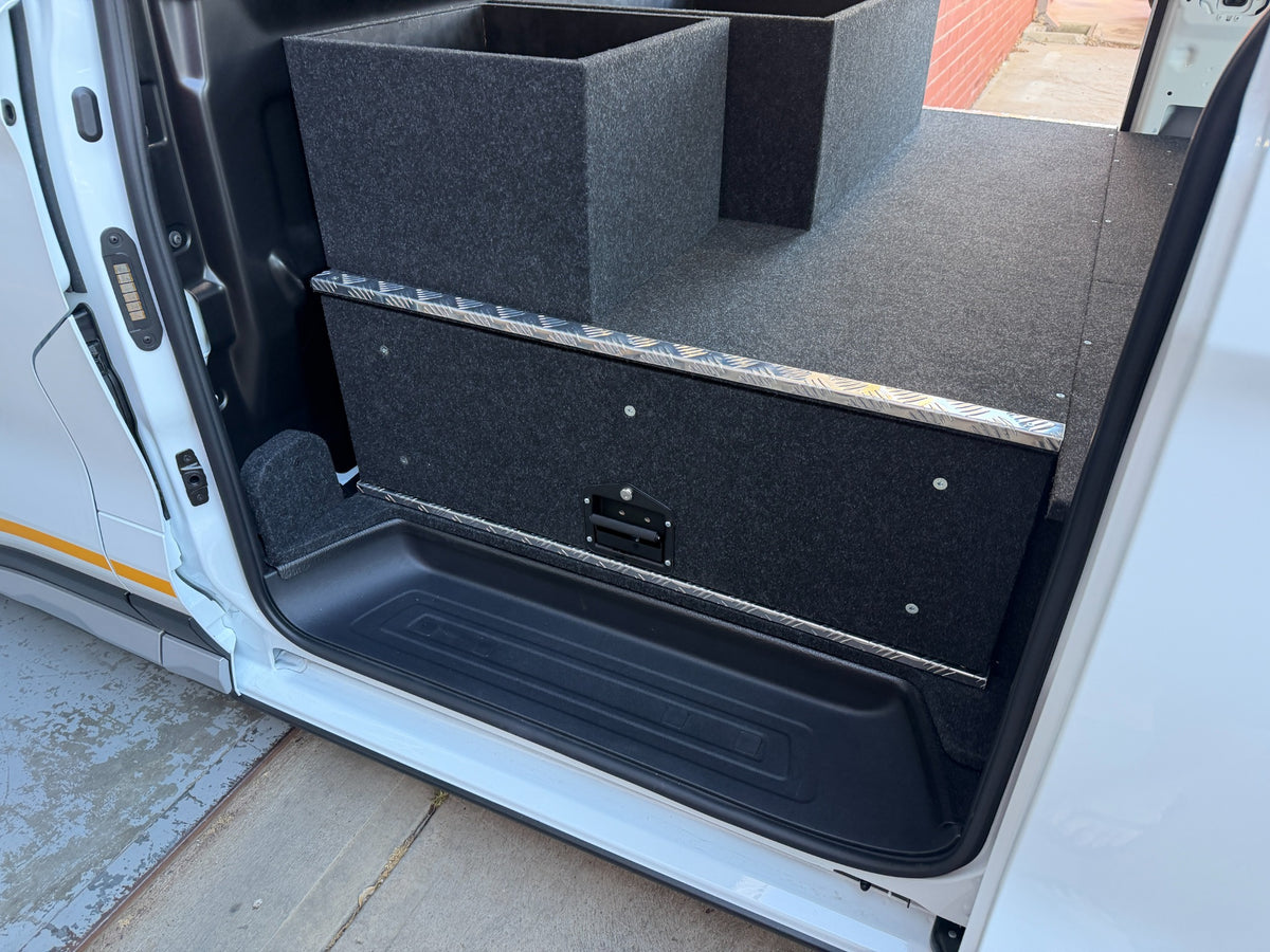 Closed twin opposed drawer and drawer-top shelving in a Ford Transit Custom