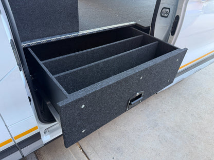 Close-up of the divided twin opposed drawer extended through the Transit Custom sliding door