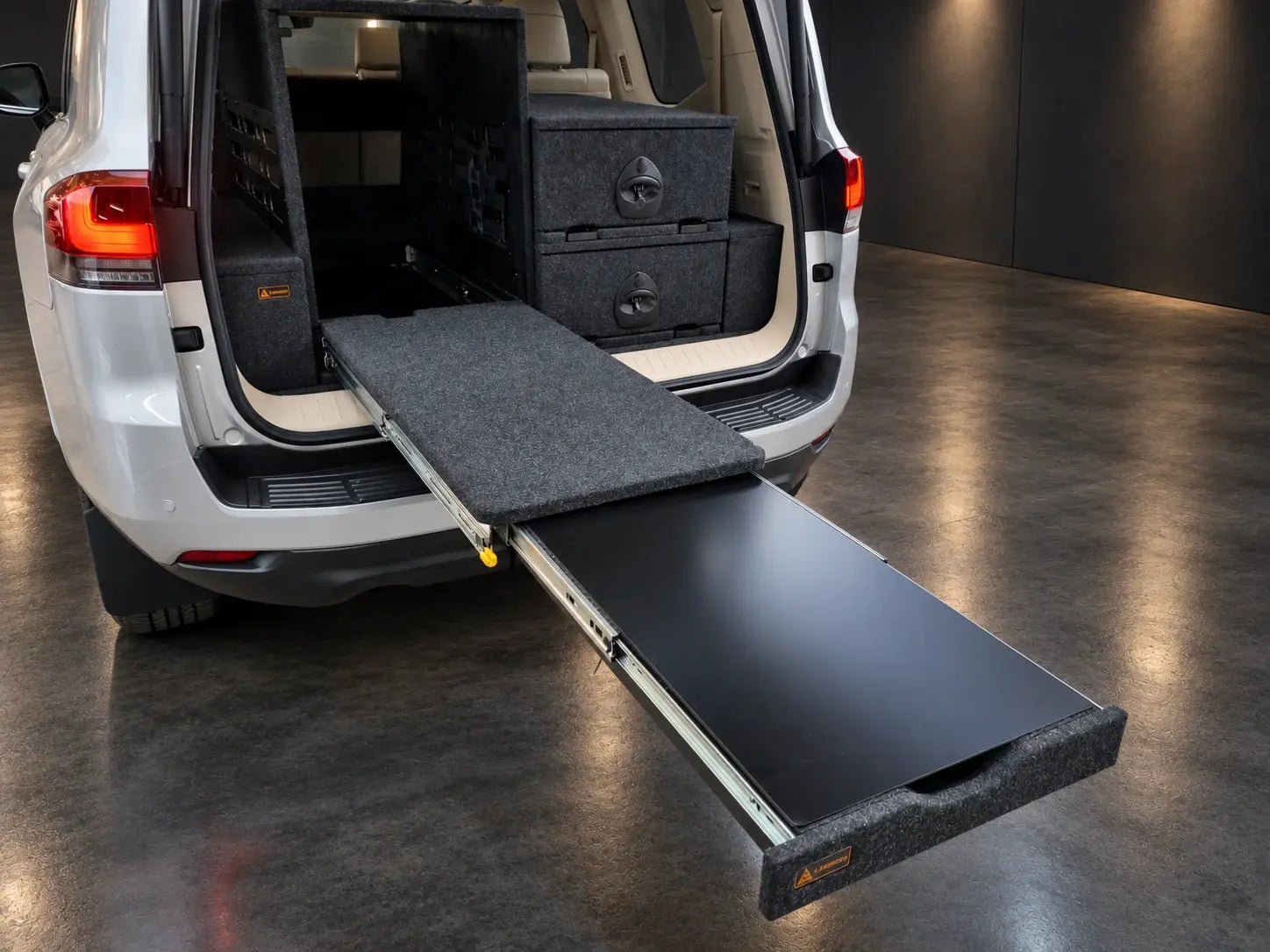 Toyota LandCruiser 300 with Lawson Automotive High Deck Slide and storage system